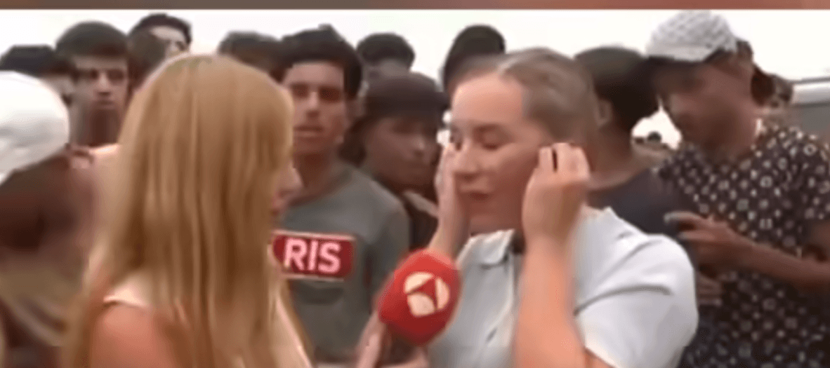 Kvinnan bryter ihop efter migrantinvasionen i Spanien