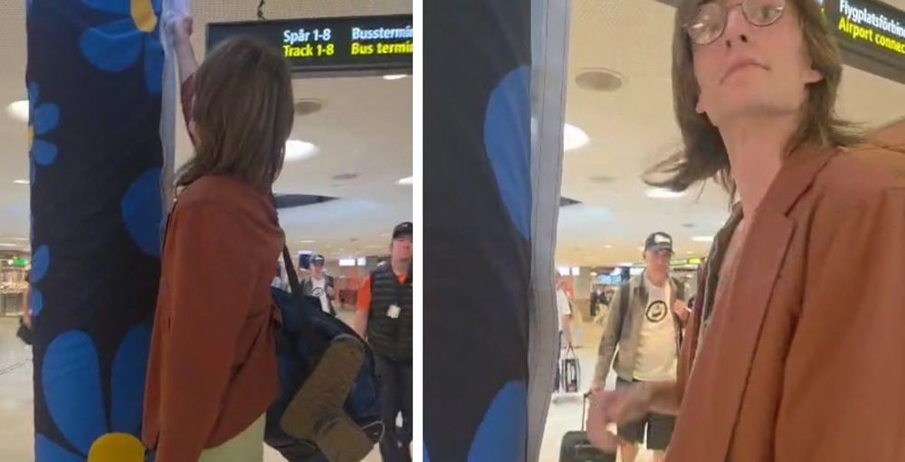 Här konfronteras mannen när han försöker riva ner SD:s banderoll