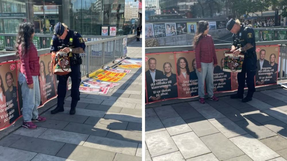 Här tar polisen kvinna som vandaliserar SD:s valaffischer