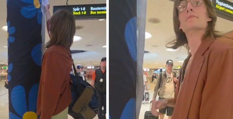 Här konfronteras mannen när han försöker riva ner SD:s banderoll